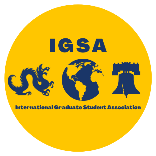 Circular yellow logo, text in blue, IGSA, image of the Drexel dragon, a globe, and the Liberty Bell above the longer title International Graduate Student Association over a yellow background